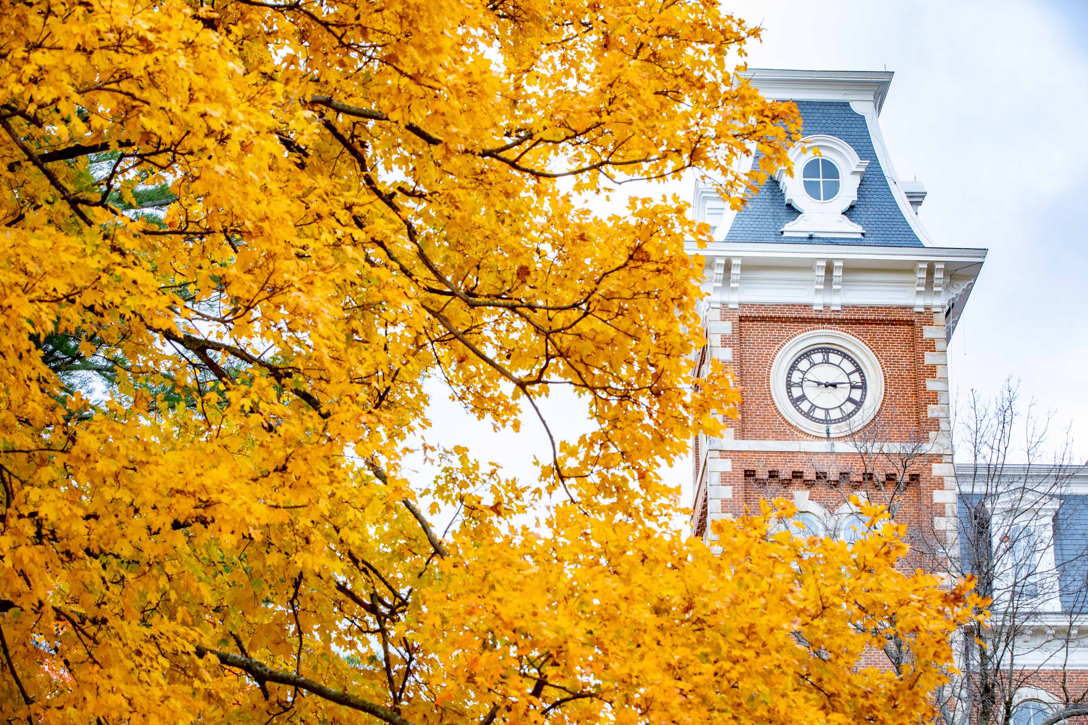 Old Main clock tower in autumn